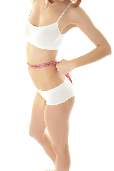 Vrouw lichaamsverzorging en maatregel op dijen — Stockfoto