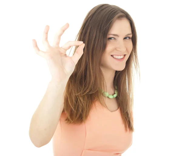 Kobieta wskazuje znak ok — Zdjęcie stockowe