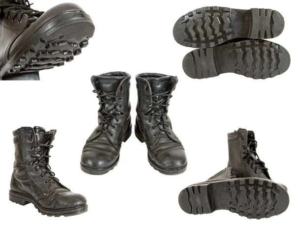 Staré černé armády boty na bílém pozadí — Stock fotografie