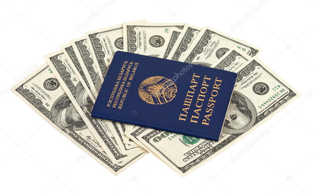 Belarusian passport and one hundred US dollars bills over white