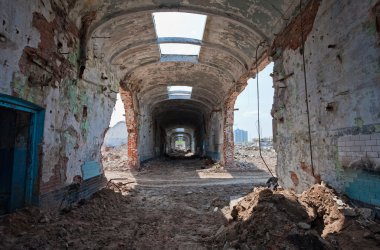 Ruins, view of an old abandoned factory building. clipart