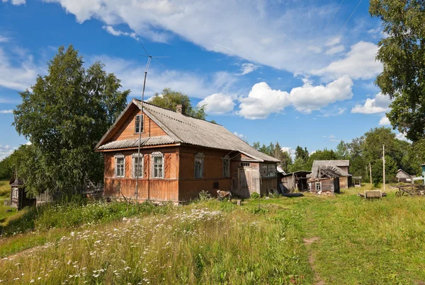 Old wooden house in russian village — Stock Photo, Image