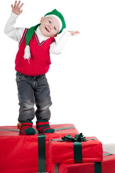 Рождественский малыш с подарками — стоковое фото