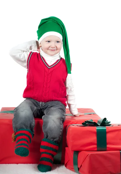 Criança de Natal com presentes — Fotografia de Stock