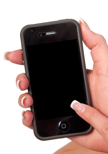 Telefoon in de handen van een meisje — Stockfoto