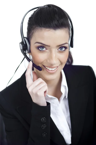 Mujer del centro de llamadas que trata con el cliente que usa auriculares —  Fotos de Stock