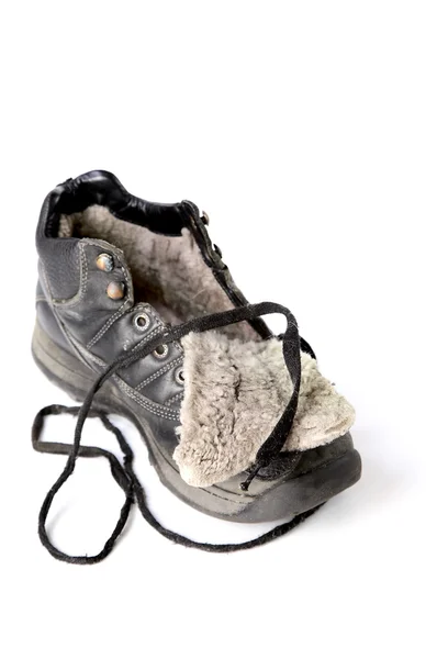 Старый зимний ботинок с кружевом — стоковое фото
