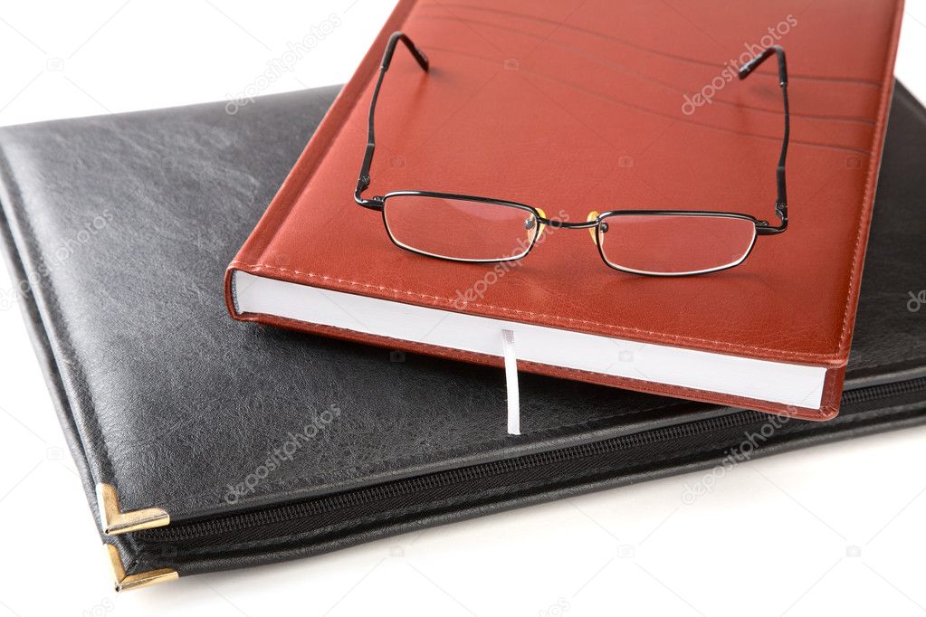 Folder for papers an organizer and glasses isolated