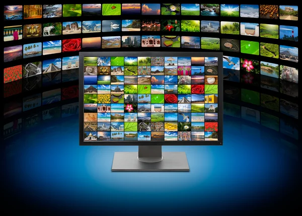 TV with images on multimedia background — Stock Photo, Image