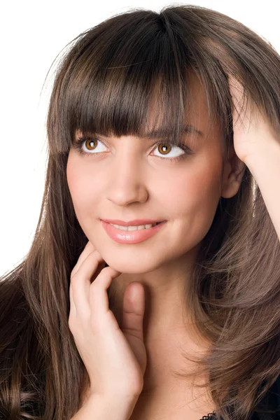 Promyšlené žena s tmavými vlasy a hnědé oči — Stock fotografie