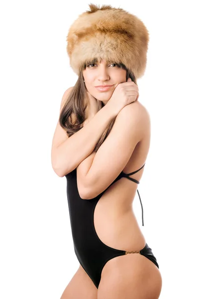 Kobieta w strój kąpielowy i futro cap — Zdjęcie stockowe