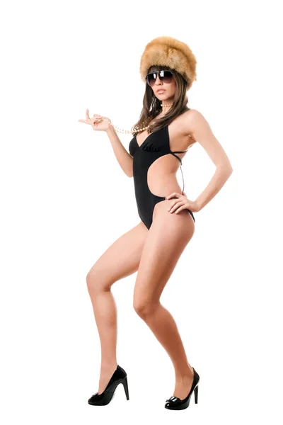 Sexy lady in sunglasses wearing swimsuit and fur-cap — Stock Photo, Image