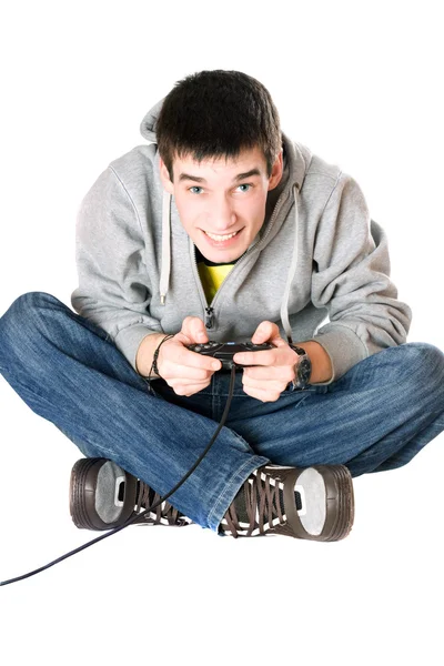 A fiatalember a joystick, a játék konzol — Stock Fotó