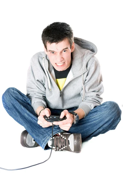 stock image Furious guy with a joystick for game console