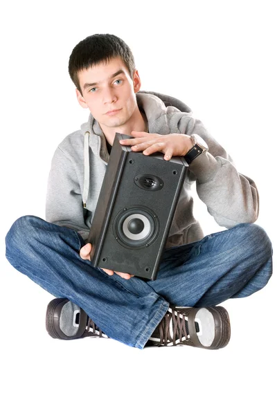 Young man with a speaker — Stock Photo, Image
