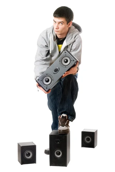 Young man with a speakers. Isolated — Stock Photo, Image