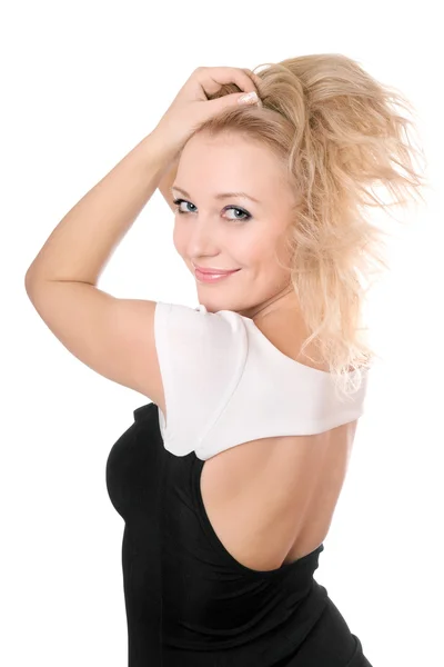 Ung blond leker med hennes hår — Stockfoto