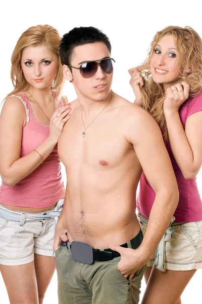 Two smiling beautiful blond women with young man — Stock Photo, Image