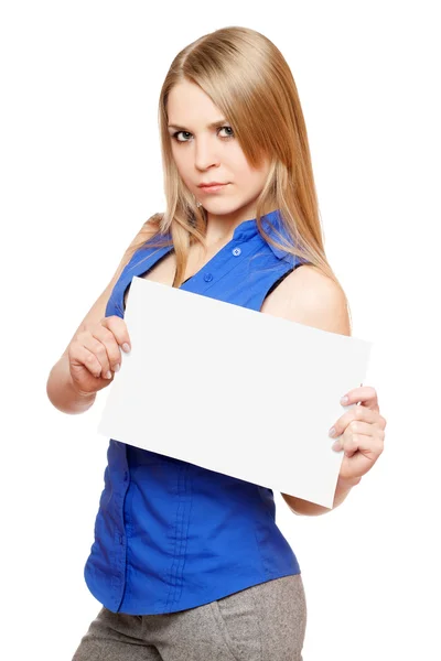 Serious young woman holding empty white board — Stock Photo, Image