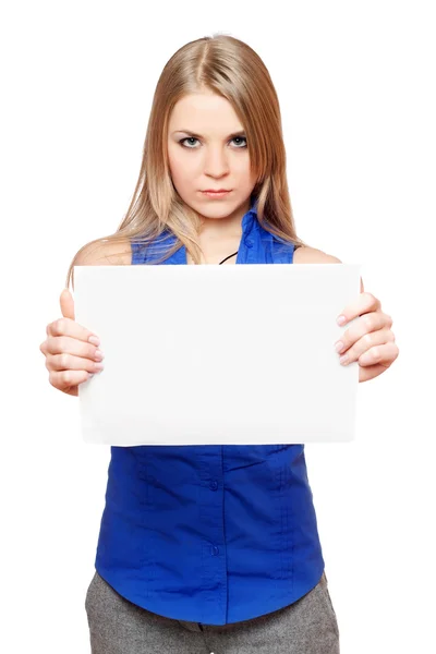 Serious young blonde holding empty white board — Stock Photo, Image