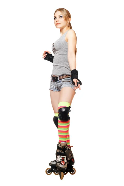 Pretty young blonde on roller skates — Stock Photo, Image