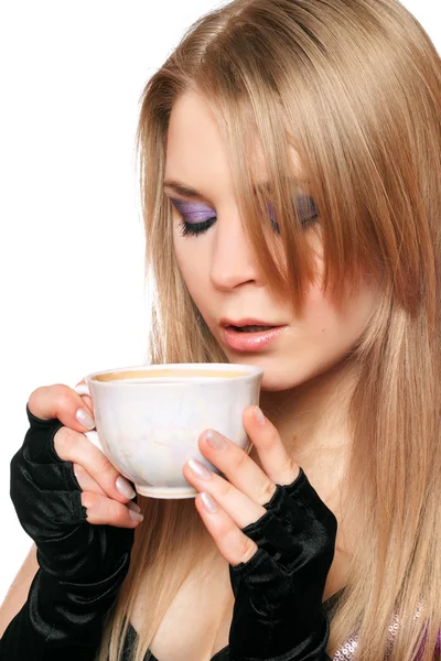 Attractive young blonde with a cup of tea. Isolated — Stock Photo, Image