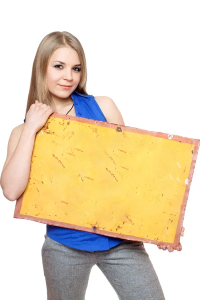 Lovely young woman posing with yellow vintage board — Stock Photo, Image