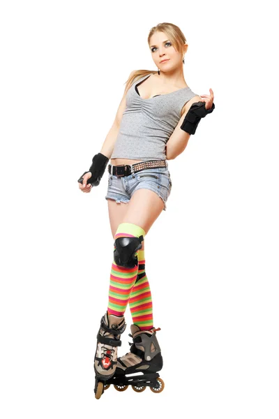 Beautiful young blonde on roller skates — Stock Photo, Image