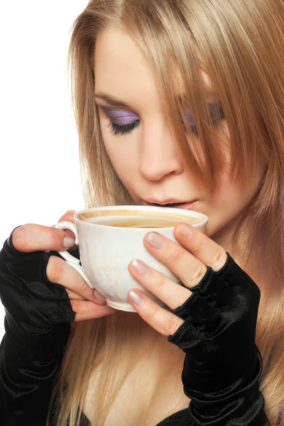 Pretty young blonde with a cup of tea. Isolated — Stock Photo, Image