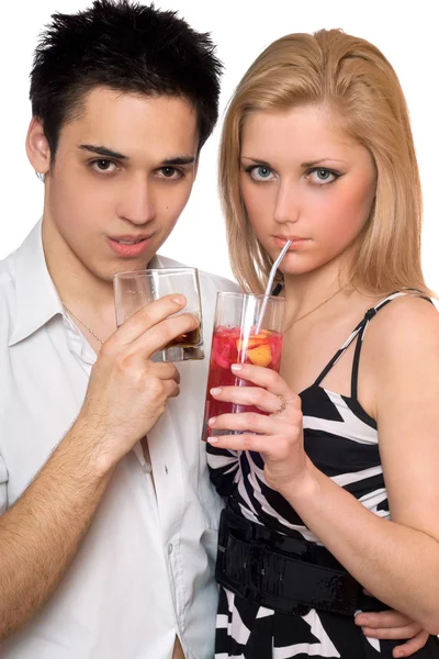 Attractive young couple with cocktails. Isolated — Stock Photo, Image