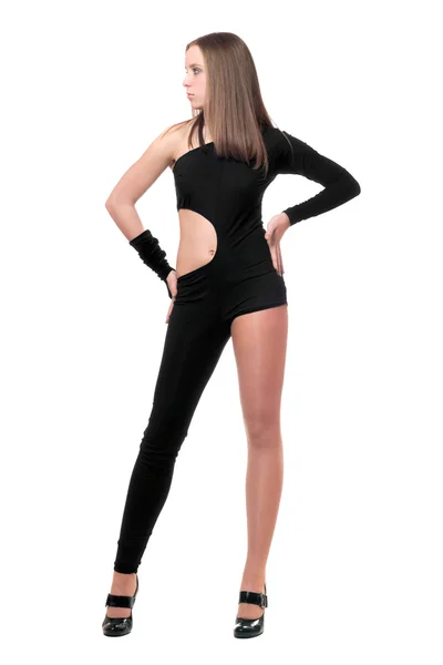 Pretty young woman in skintight black costume — Stock Photo, Image