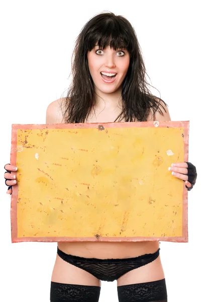 Překvapený bruneta s vintage žluté desky — Stock fotografie