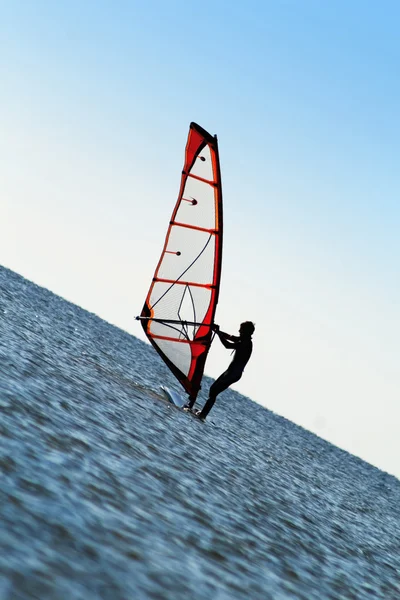 Silhouette of a windsurfer on the sea — Stock Photo, Image