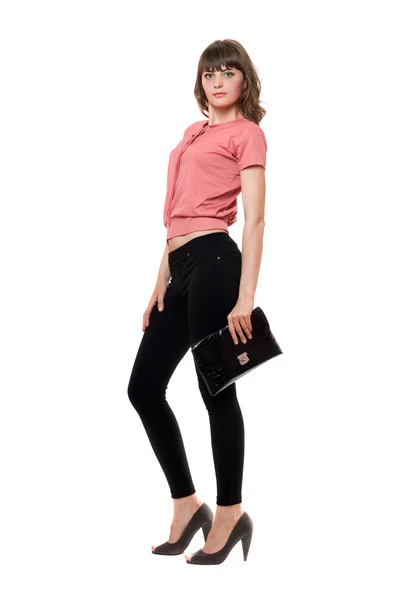 Jonge vrouw in een zwarte leggings. geïsoleerd — Stockfoto