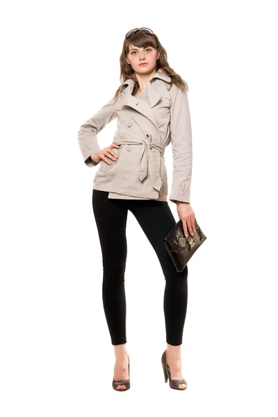 Söt flicka klädd i en jacka och svarta leggings — Stockfoto