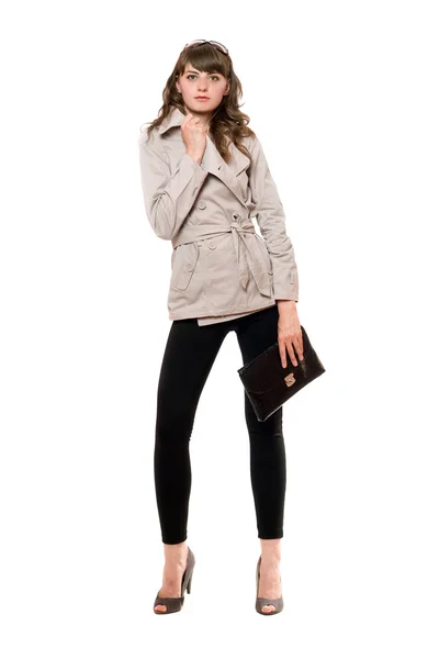Menina atraente vestindo um casaco e leggings pretos — Fotografia de Stock