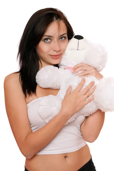 Drömmande söt tjej med en nallebjörn — Stockfoto