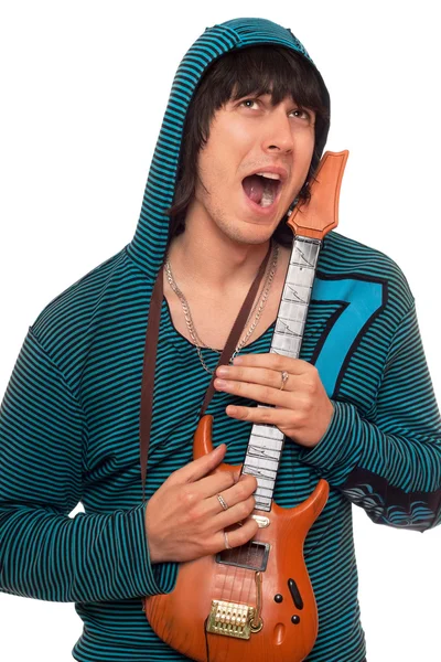 Crazy young man with a little guitar — Stock Photo, Image