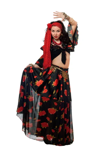 Dancing gypsy woman in a black skirt — Stock Photo, Image