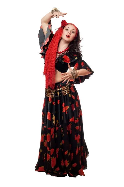 Expressive gypsy woman in a black skirt. Isolated — Stock Photo, Image