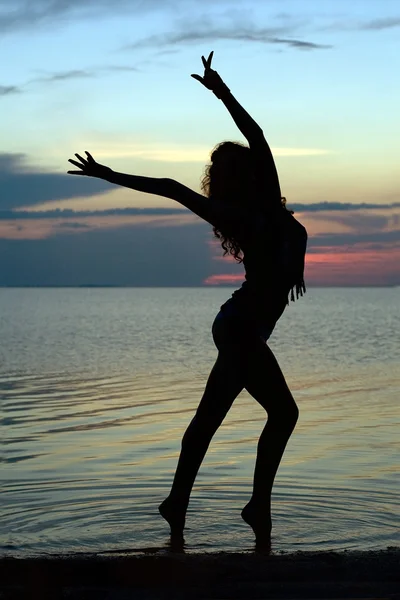 Silhouette of a sexy young woman — Stock Photo, Image