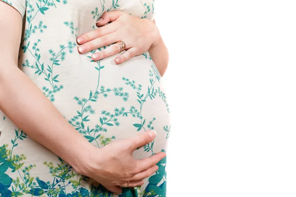 Brzuch w ciąży dziewczyna w sukience. na białym tle — Zdjęcie stockowe