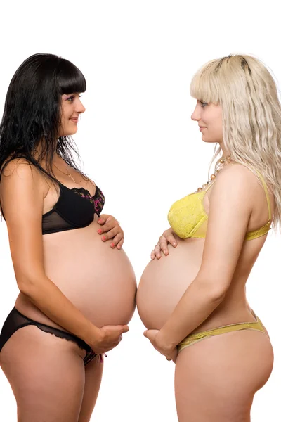 Schwangere Blondine und Brünette. isoliert — Stockfoto