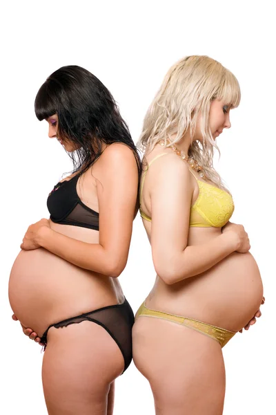 Dvě těhotné mladé ženy. samostatný — Stock fotografie