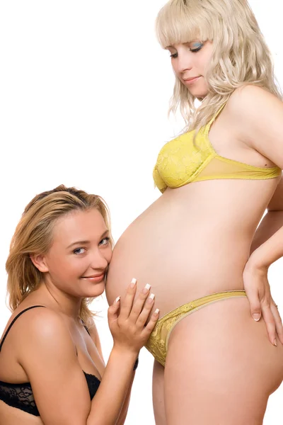 Pregnant woman with the pretty girlfriend. Isolated — Stock Photo, Image