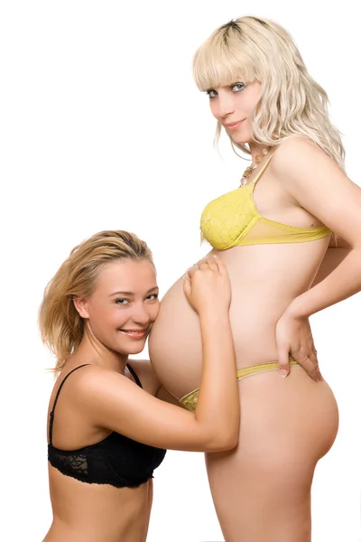 Pregnant woman with the girlfriend. Isolated — Stock Photo, Image