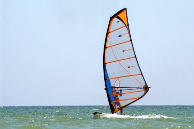 Windsurfer on the sea clipart