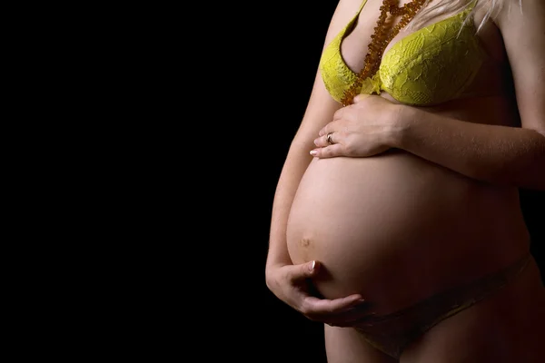 Brzuch dziewczyny w ciąży. na białym tle — Zdjęcie stockowe