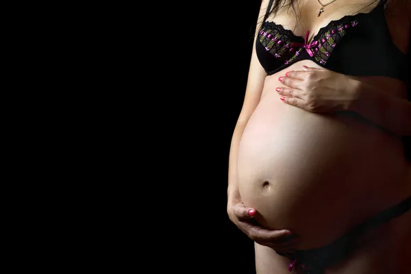 妊娠中の女性の腹。分離されました。 — Stock fotografie