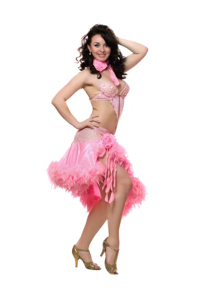 Wesoła brunetka w różowy sukienka taniec. na białym tle — Zdjęcie stockowe